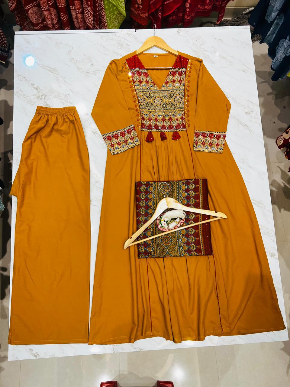 KIMAYRA Mustard Yellow Embroidered Empire Anarkali Kurta Set